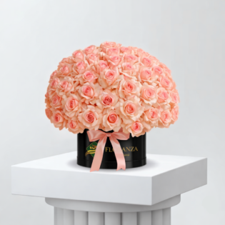 Pink peony bouquet wrapped in yellow paper